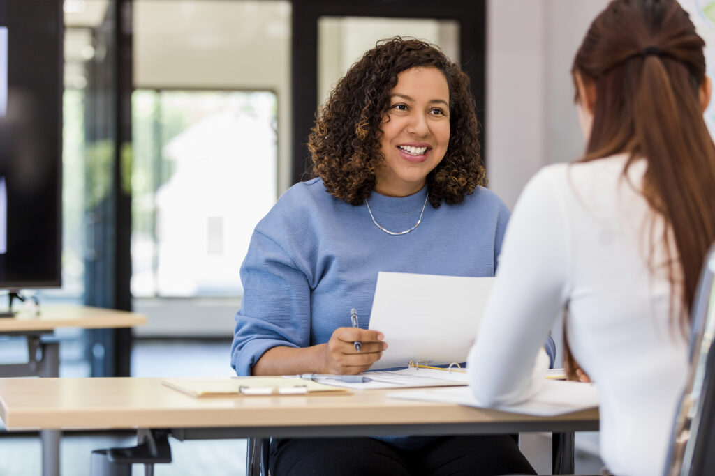 hiring manager smiling at potential candidate